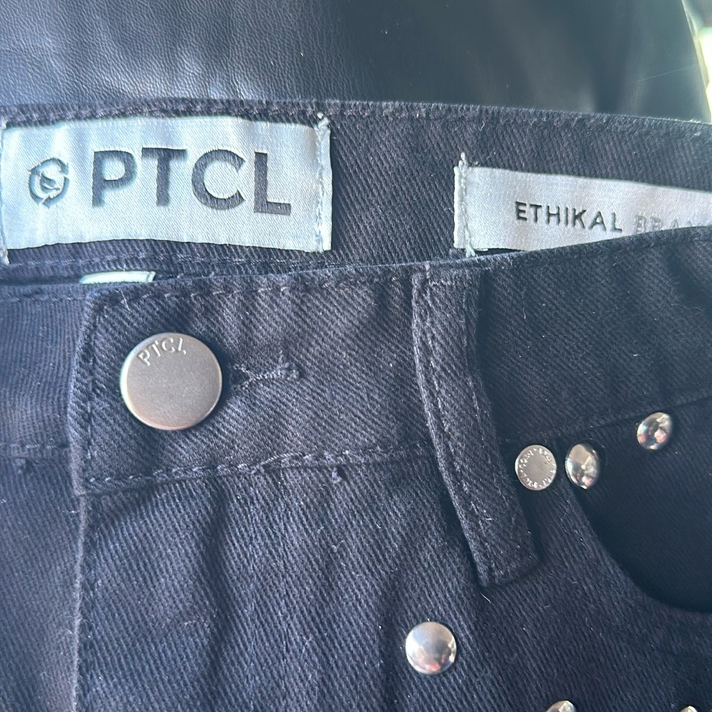 Ethikal brand black stud mini skirt.